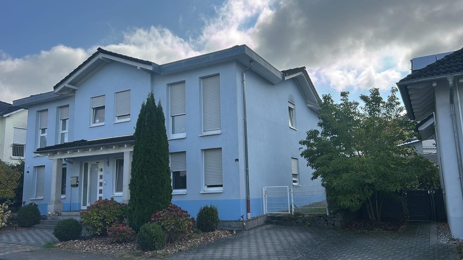 TLA Ramstein apartment building — modern blue house near Ramstein Air Base